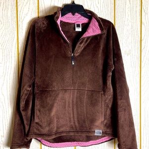 The North Face pull over.  Very soft and comfy, pink trail front packets